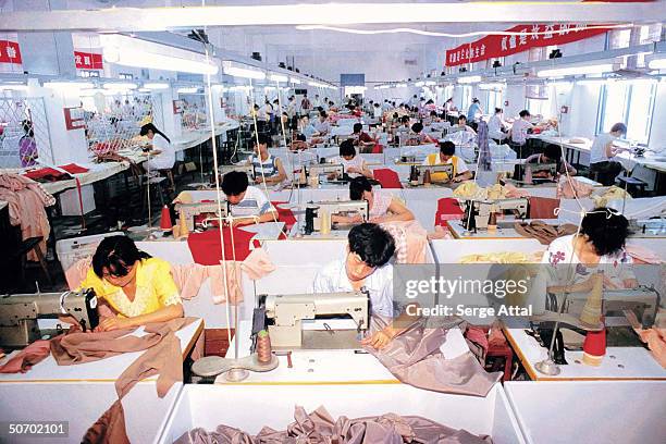 Workers in privately-owned textile factory.