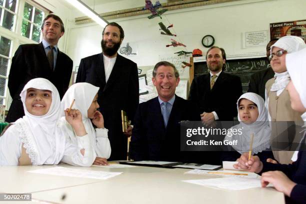 Britain's Prince Charles with singer Yusuf Islam at the Islamia Primary School in north-west London.