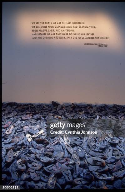 Immense pile of shoes amassed from mostly Jewish victims exterminated by German Nazis at death camps during WWII, exhibit at US Holocaust Memorial...