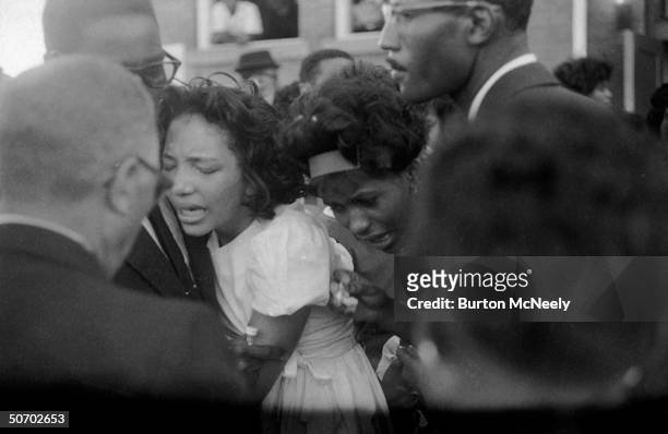 Mourners at a funeral for victims of 16th Street Baptist Church bombing, Birmingham, Alabama, late September, 1963.