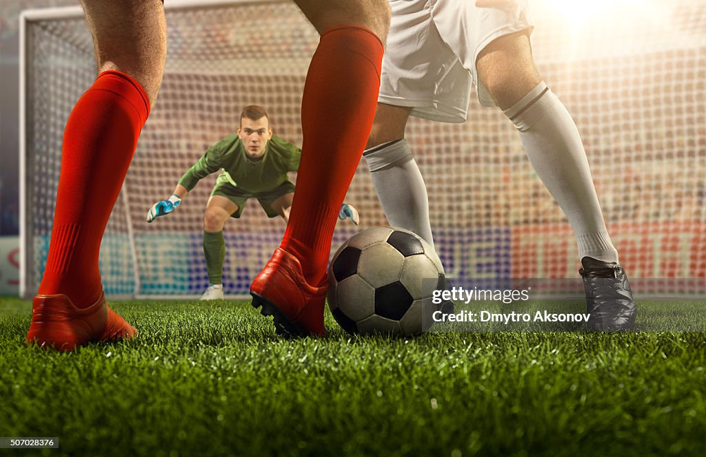 Soccer game moment with goalkeeper