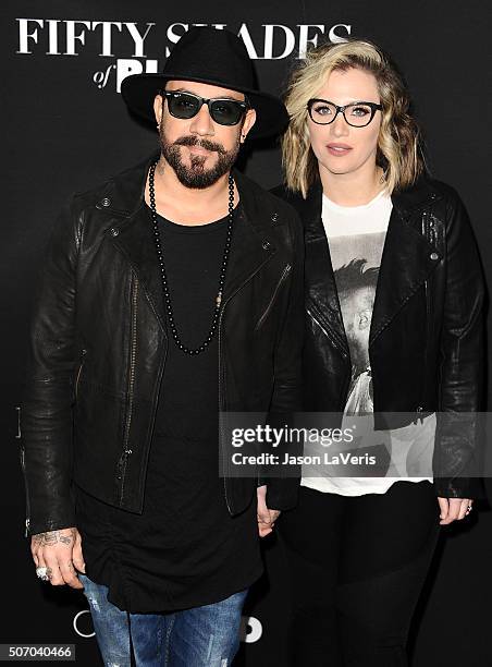 McLean and wife Rochelle Deanna Karidis attend the premiere of "Fifty Shades of Black" at Regal Cinemas L.A. Live on January 26, 2016 in Los Angeles,...