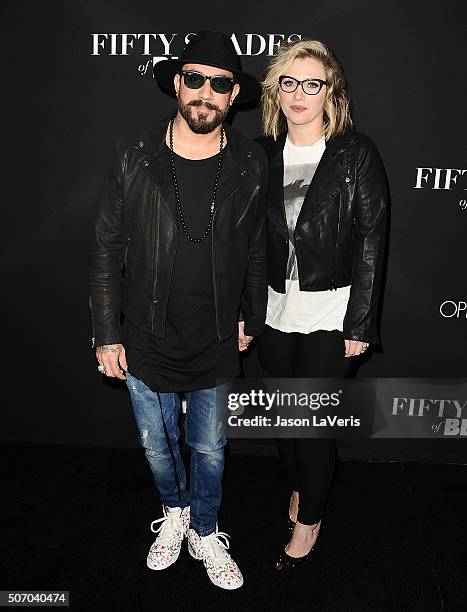 McLean and wife Rochelle Deanna Karidis attend the premiere of "Fifty Shades of Black" at Regal Cinemas L.A. Live on January 26, 2016 in Los Angeles,...