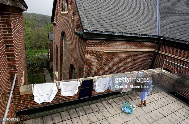 Sister Solana hanging laundry, among the 678 subjects of the long-term Nun Study of Alzheimer's disease which University of Kentucky researcher Dr....