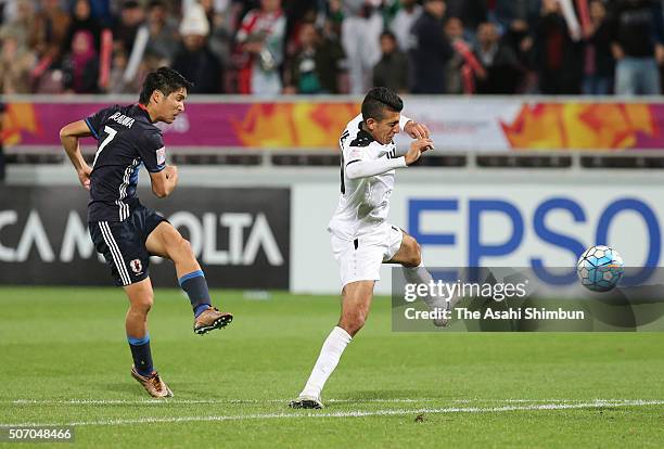 Riki Harakawa of Japan scores his team's second goal during the AFC U-23 Championship semi final match between Japan and Iraq at the Abdullah Bin...