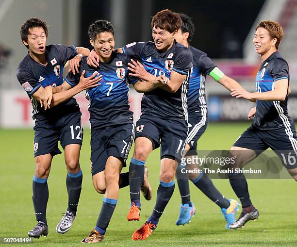 Riki Harakawa of Japan celebrates scoring his team's second goal with his team mates during the AFC U-23 Championship semi final match between Japan...