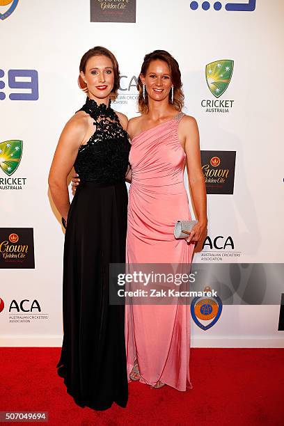 Stephanie Kierce and Julie Hunter arrive at the 2016 Allan Border Medal ceremony at Crown Palladium on January 27, 2016 in Melbourne, Australia.