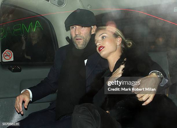 Jason Statham and Rosie Huntington-Whiteley are seen leaving The IVY restaurant on January 26, 2016 in London, England.