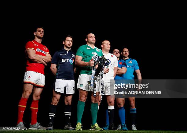 International rugby captains Wales' Sam Warburton, Scotland's Greg Laidlaw, Ireland's Rory Best holding the trophy, England's Dylan Hartley, France's...