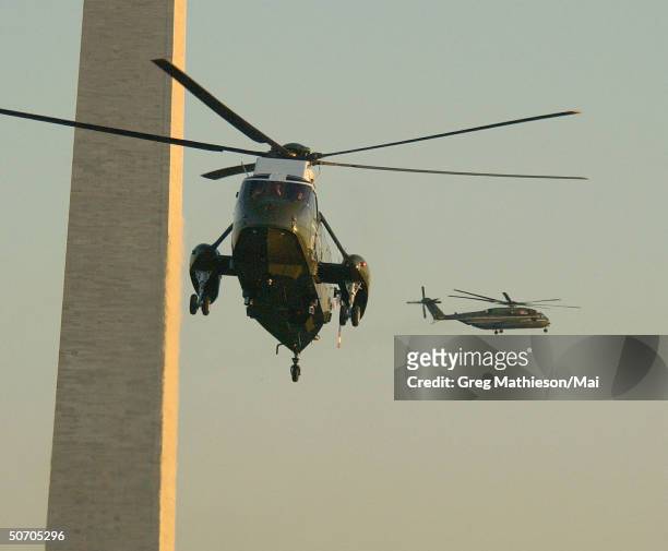 Marine One containing President George W. Bush arriving in Washington following announcements of terrorist attacks on the Pentagon and the World...