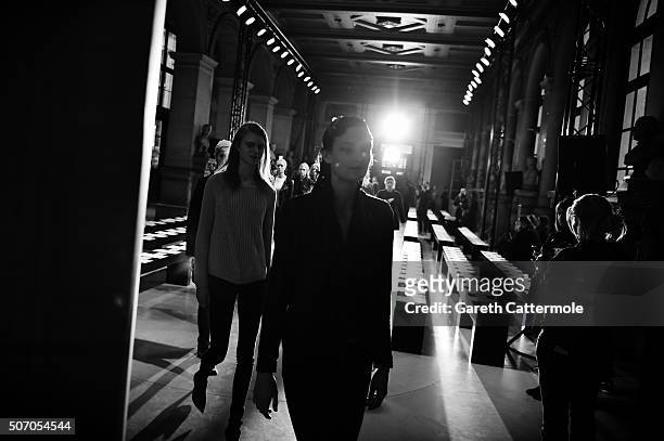 Models rehearse backstage before the Yiqing Yin show as part of Paris Fashion Week Haute Couture Spring/Summer 2015 on January 26, 2015 in Paris,...
