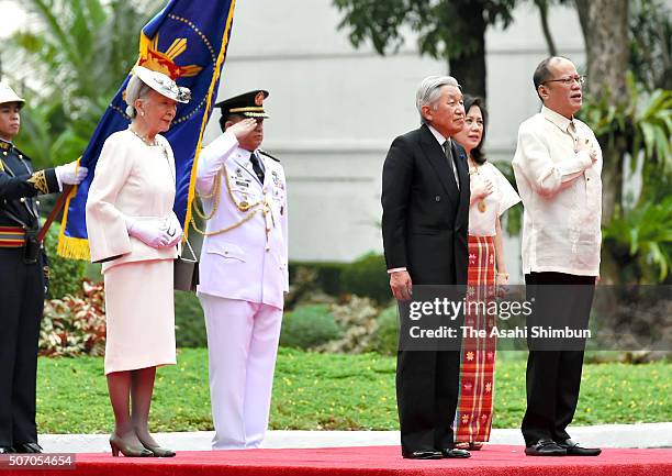 Emperor Akihito and Empress Michiko attend a welcoming ceremony alongside Filipino President Benigno Aquino and his sister Aurora Corazon...