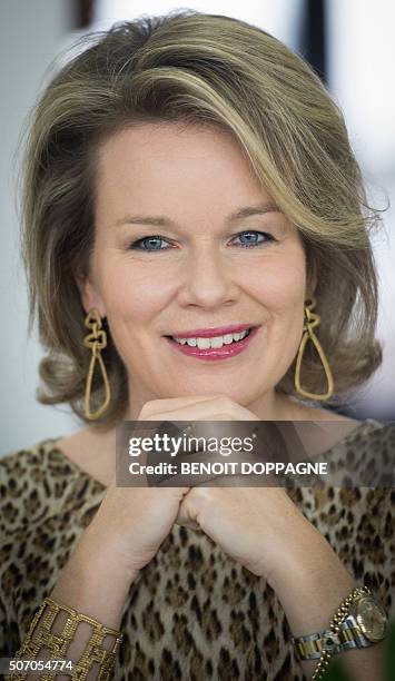 Queen Mathilde of Belgium smiles during a visit at the CAW Brussels on January 27, 2016 in Brussels. / AFP / BELGA / BENOIT DOPPAGNE / Belgium OUT