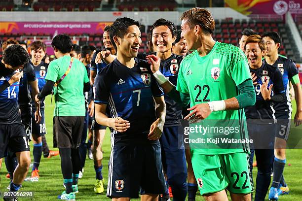 Riki Harakawa and Daichi Sugimoto of Japan celebrate qualifying for the Rio de Janeiro Olympics after winning the AFC U-23 Championship semi final...