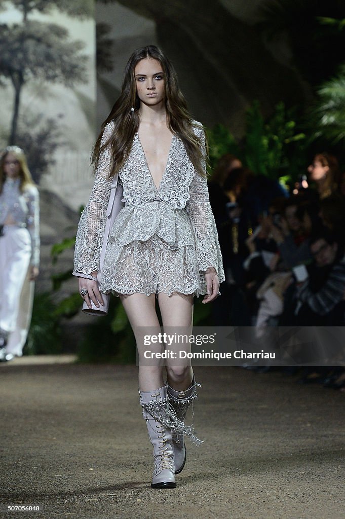 A model walks the runway during the Elie Saab Haute Couture Spring ...