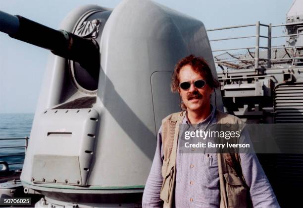 Photographer Barry Iverson aboard the guided missile cruiser USS Philippine Sea during an OP Enduring Freedom mission in the US attack on Afghanistan...