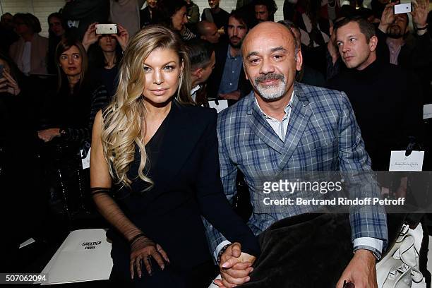 Singer Fergie and Christian Louboutin attend the Jean Paul Gaultier Spring Summer 2016 show as part of Paris Fashion Week on January 27, 2016 in...