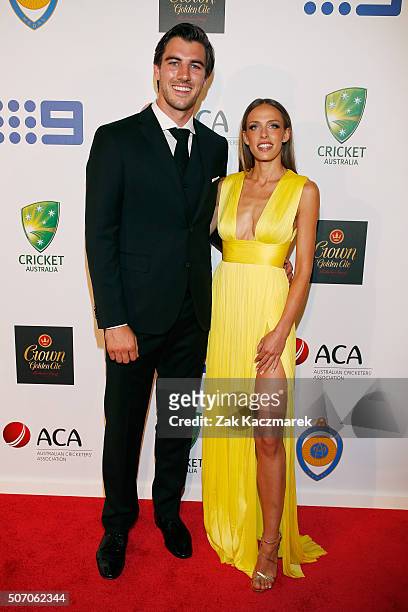 Patrick Cummins and Becky Boston arrive at the 2016 Allan Border Medal ceremony at Crown Palladium on January 27, 2016 in Melbourne, Australia.