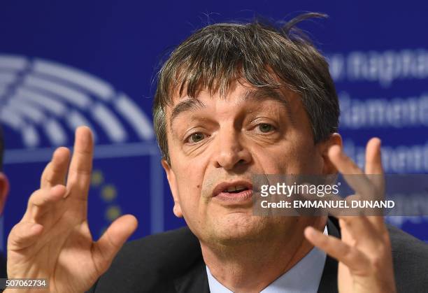 Presidential candidate Jerome Champagne gestures while speaking during a press conference at the European Parliament in Brussels, on January 27,...