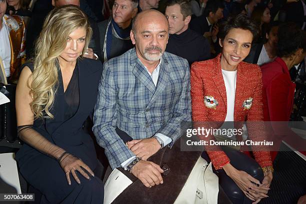 Fergie, Christian Louboutin and Faride Khelfa attend the Jean-Paul Gaultier Haute Couture Spring Summer 2016 show as part of Paris Fashion Week on...