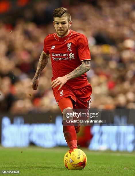 Alberto Moreno of Liverpool in action during the Capital One Cup Semi Final Second Leg match between Liverpool and Stoke City at Anfield on January...