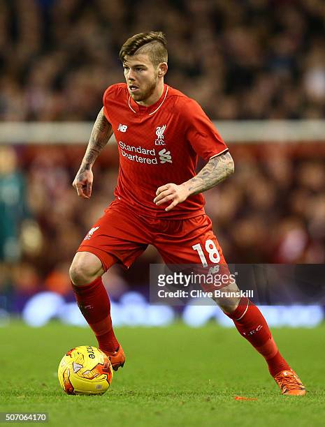 Alberto Moreno of Liverpool in action during the Capital One Cup Semi Final Second Leg match between Liverpool and Stoke City at Anfield on January...