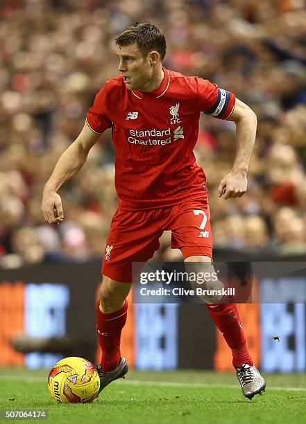 James Milner of Liverpool in action during the Capital One Cup Semi Final Second Leg match between Liverpool and Stoke City at Anfield on January 26,...