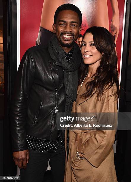 Actor Bill Bellamy and Kristen Baker Bellamy attend the premiere of Open Road Films' "Fifty Shades of Black" at Regal Cinemas L.A. Live on January...