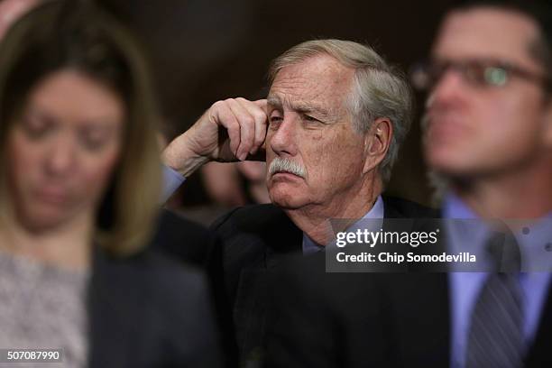 Sen. Angus King joins the public audience during a Senate Judiciary Committee hearing about the recent spike in heroin and prescription drug abuse...