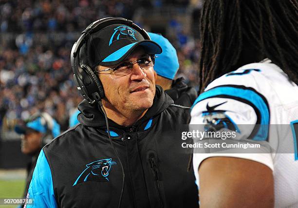 Head Coach Ron Rivera of the Carolina Panthers speals with Chris Scott against the Arizona Cardinals during the NFC Championship Game at Bank Of...