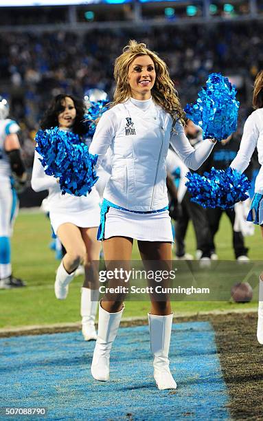 Member of the Carolina Panthers Cheerleaders performs during the NFC Championship Game against the Arizona Cardinals at Bank Of America Stadium on...