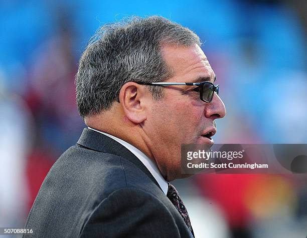 General Manager Dave Gettleman of the Carolina Panthers watches warms up before the NFC Championship Game against the Arizona Cardinals at Bank Of...
