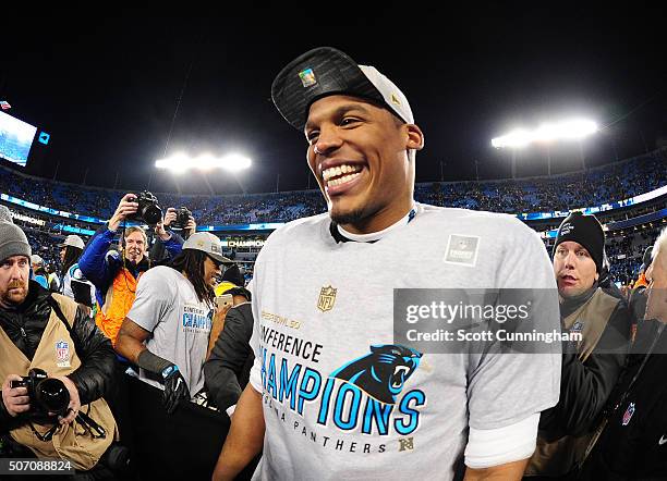 Cam Newton of the Carolina Panthers celebrates after the NFC Championship Game against the Arizona Cardinals at Bank Of America Stadium on January...