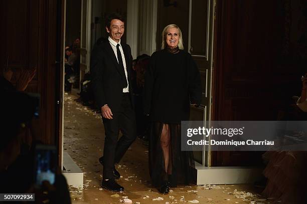 Maria Grazia Chiuri and Pier Paolo Picciolis pose on the runway during the Valentino Haute Couture Spring Summer 2016 show as part of Paris Fashion...