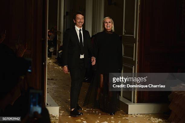 Maria Grazia Chiuri and Pier Paolo Picciolis pose on the runway during the Valentino Haute Couture Spring Summer 2016 show as part of Paris Fashion...