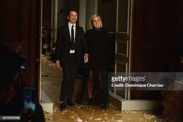 Maria Grazia Chiuri and Pier Paolo Picciolis pose on the runway during the Valentino Haute Couture Spring Summer 2016 show as part of Paris Fashion...