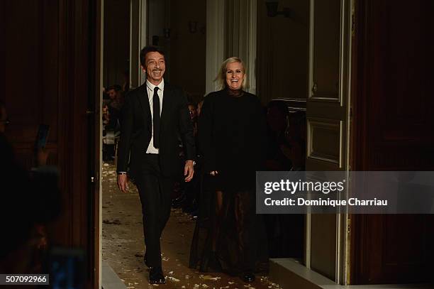 Maria Grazia Chiuri and Pier Paolo Picciolis pose on the runway during the Valentino Haute Couture Spring Summer 2016 show as part of Paris Fashion...