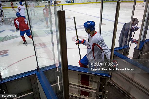 John Scott, a 6-foot-8 brawler type hockey player, takes the ice with the St. John's Ice Caps, an AHL affiliate of the Montreal Canadians, at the...
