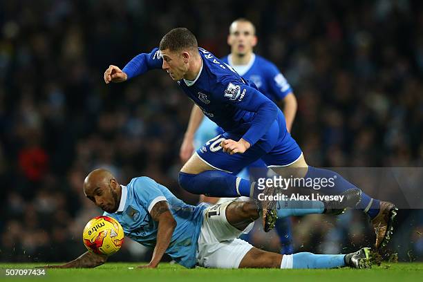 Ross Barkley of Everton is brought down by Fabian Delph of Manchester City during the Capital One Cup Semi Final, second leg match between Manchester...