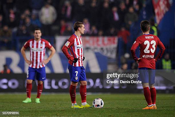 Antoine Greizmann of Club Atletico de Madrid waits to restart play after Celta Vigo scored their 3rd goal during the Copa del Rey Quarter Final 2nd...