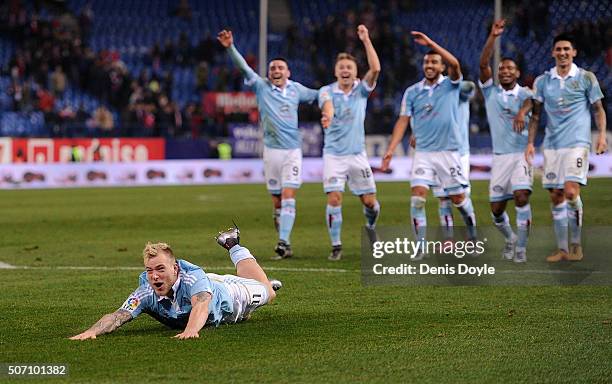 John Guidetti of Celta Vigo celebrates his team beat Club Atletico de Madrid 3-2 during the Copa del Rey Quarter Final 2nd Leg match between Club...