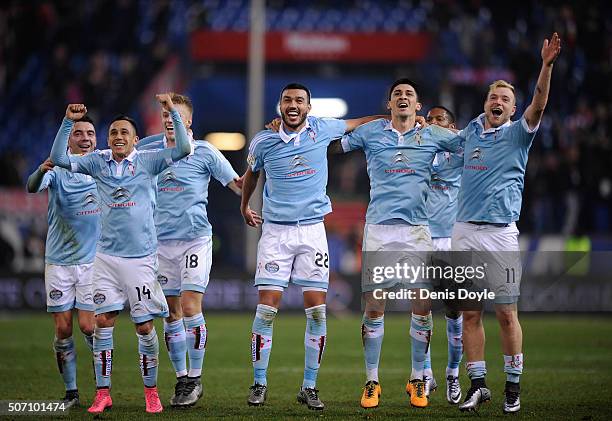 John Guidetti of Celta Vigo celebrates with Fabian Orellana and Gustavo Cabral after Celta beat Club Atletico de Madrid 3-2 in the Copa del Rey...