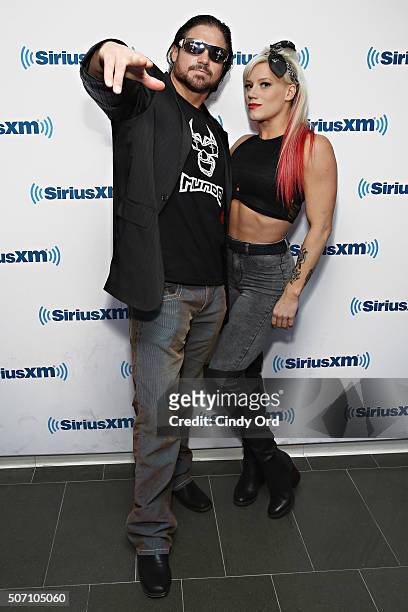 Wrestlers Johnny Mundo and Taya Valkyrie visit the SiriusXM Studios on January 27, 2016 in New York City.