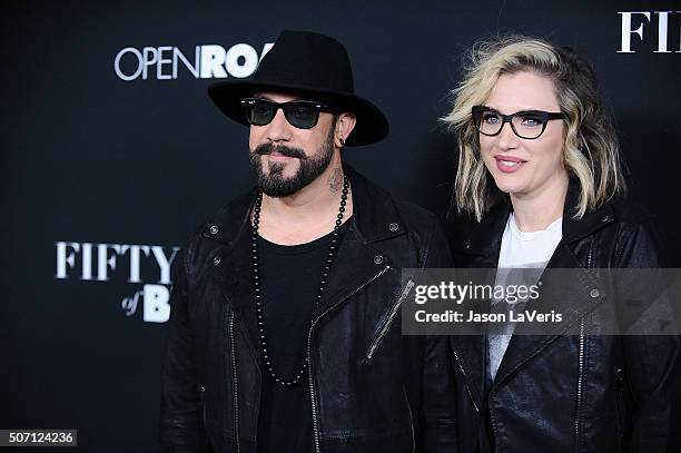 McLean and wife Rochelle Deanna Karidis attend the premiere of "Fifty Shades of Black" at Regal Cinemas L.A. Live on January 26, 2016 in Los Angeles,...