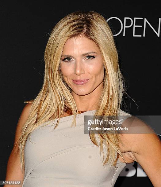Model Torrie Wilson attends the premiere of "Fifty Shades of Black" at Regal Cinemas L.A. Live on January 26, 2016 in Los Angeles, California.