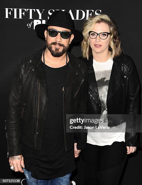 McLean and wife Rochelle Deanna Karidis attend the premiere of "Fifty Shades of Black" at Regal Cinemas L.A. Live on January 26, 2016 in Los Angeles,...