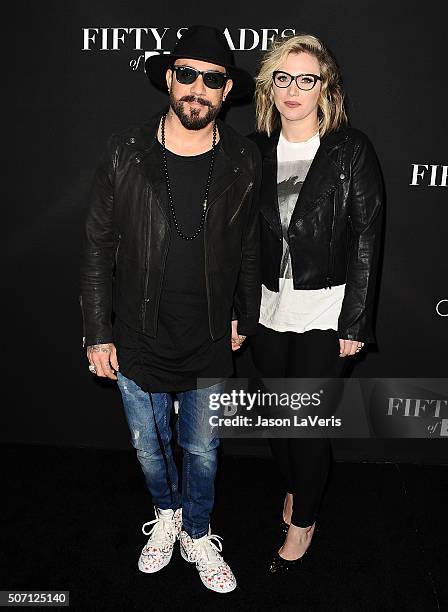 McLean and wife Rochelle Deanna Karidis attend the premiere of "Fifty Shades of Black" at Regal Cinemas L.A. Live on January 26, 2016 in Los Angeles,...