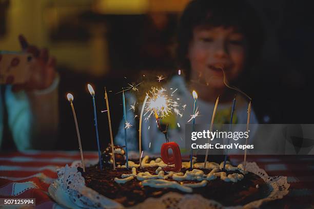 blowing candles - couple tongue kissing stock-fotos und bilder