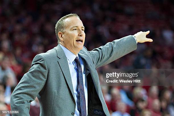 Head coach Billy Kennedy of the Texas A&M Aggies yells to his team during the first half of a game against the Arkansas Razorbacks at Bud Walton...