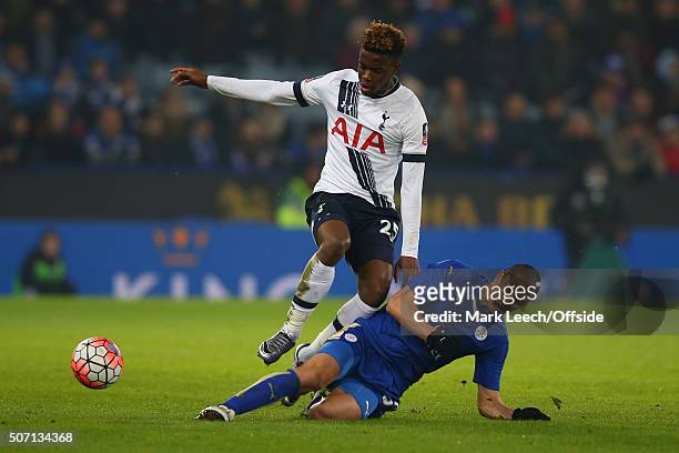 Josh Onomah of Tottenham Hotspur in action with Gokhan Inler of Leicester City during the The Emirates FA Cup Third Round Replay between Leicester...